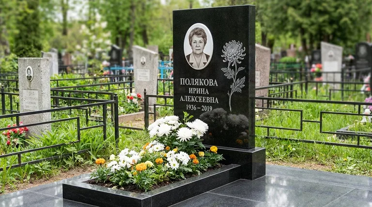 Памятник с гравировкой хризантем — выполненная работа «Полякова» в Ярославле
