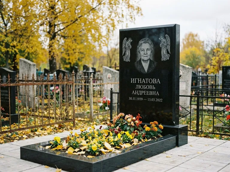 Памятник с гравировкой ангела — гравировка двух ангелов по сторонам портрета, работа «Игнатова» в Ярославле
