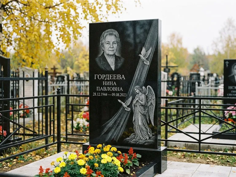 Памятник с гравировкой ангела — гравировка ангела с голубем по диагонали стелы, работа «Гордеева» в Ярославле