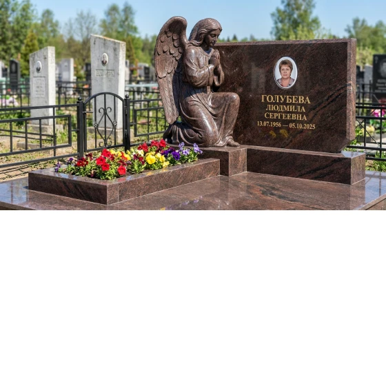 Гранитный памятник фигурный с гравировкой винограда и ангела